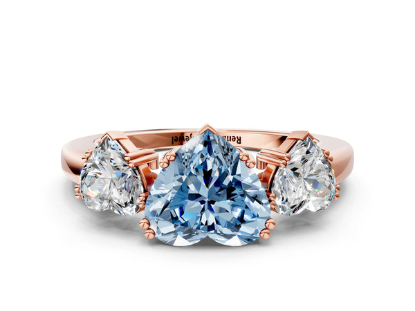 Rose gold Three-Stone Fancy Blue Heart Cut Cut Diamond Ring with Channel Set Band and Four-Prong Setting