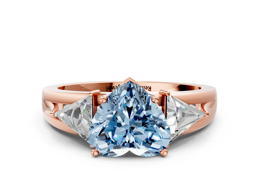 Rose gold Three-Stone Fancy Blue Heart Cut Cut Diamond Ring with Trillion Side Stones on a Split Shank Band