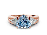 Rose gold Three-Stone Fancy Blue Heart Cut Cut Diamond Ring with Trillion Side Stones on a Split Shank Band