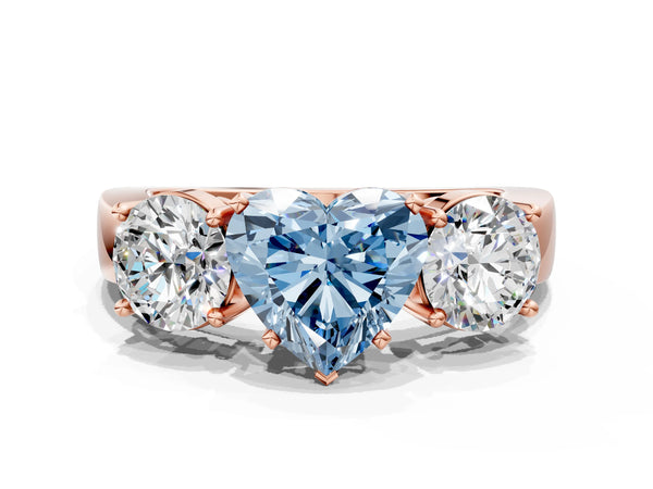 Rose gold Three-Stone Fancy Blue Heart Cut Diamond Ring with Round Side Stones, Classic Band, and Four-Prong Setting