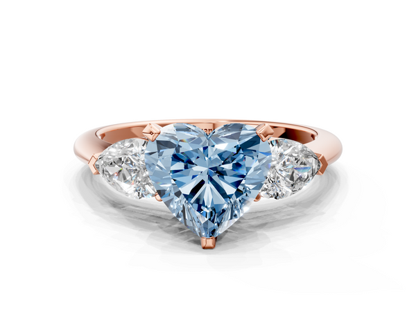 Rose gold Three-Stone Fancy Blue Heart Cut Diamond Ring with Pear Side Stones and Four-Prong Setting