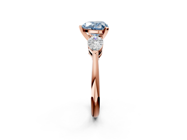 Rose gold Three-Stone Fancy Blue Heart Cut Diamond Ring with Pear Side Stones and Four-Prong Setting