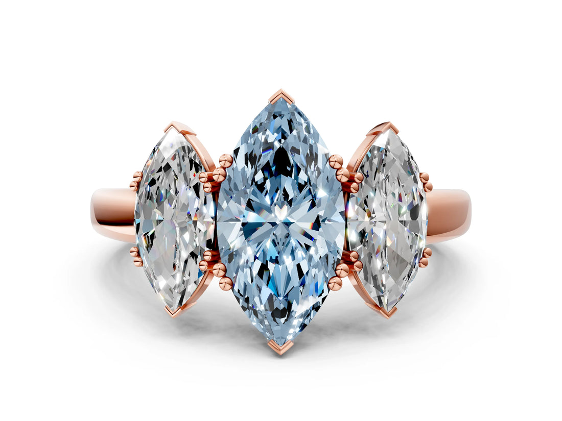 Rose gold Three-Stone Fancy Blue Marquise Cut Cut Diamond Ring with Channel Set Band and Four-Prong Setting