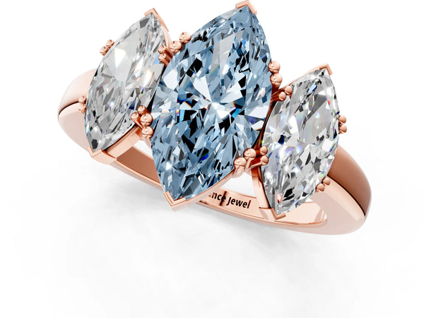 Rose gold Three-Stone Fancy Blue Marquise Cut Cut Diamond Ring with Channel Set Band and Four-Prong Setting
