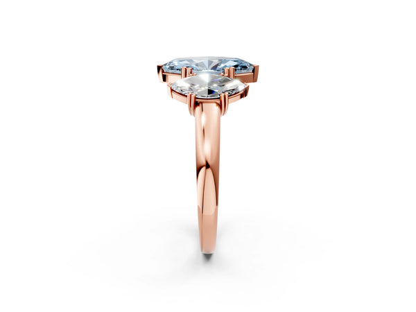Rose gold Three-Stone Fancy Blue Marquise Cut Cut Diamond Ring with Channel Set Band and Four-Prong Setting
