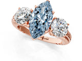 Rose gold Three-Stone Fancy Blue Marquise Cut Cut Diamond Ring with Channel-Set Band and Prong Setting_1