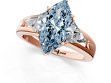 Rose gold Three-Stone Fancy Blue Marquise Cut Cut Diamond Ring with Trillion Side Stones on a Split Shank Band_1