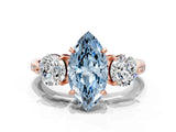Rose gold Three-Stone Fancy Blue Marquise Cut Diamond Channel Set Engagement Ring with Prong Setting