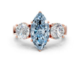 Rose gold Three-Stone Fancy Blue Marquise Cut Diamond Ring with Round Side Stones, Classic Band, and Four-Prong Setting