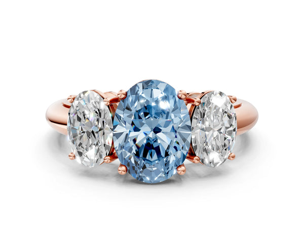 Rose gold Three-Stone Fancy Blue Oval Cut Cut Diamond Engagement Ring with Prong Setting on a White Gold Band