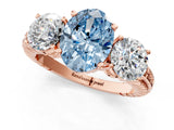 Rose gold Three-Stone Fancy Blue Oval Cut Cut Diamond Ring with Channel-Set Band and Prong Setting_1