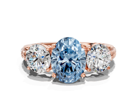Rose gold Three-Stone Fancy Blue Oval Cut Cut Diamond Ring with Channel-Set Band and Prong Setting