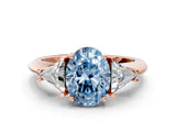 Rose gold Three-Stone Fancy Blue Oval Cut Cut Diamond Ring with Trillion Side Stones and Four-Prong Setting_3