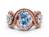 Rose gold Three-Stone Fancy Blue Oval Cut Diamond Wave Pave Band with Prong Setting