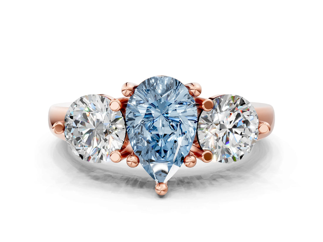 Rose gold Three-Stone Fancy Blue Pear  Brilliant Cut Solitaire Ring with Prong Setting on a Classic Band 1