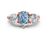 Rose gold Three-Stone Fancy Blue Pear  Brilliant Cut Solitaire Ring with Prong Setting on a Classic Band 1