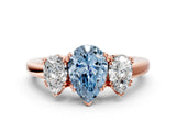 Rose gold Three-Stone Fancy Blue Pear Cut Cut Diamond Ring with Channel Set Band and Four-Prong Setting_24