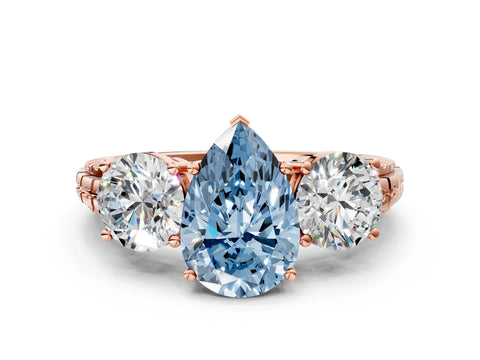 Rose gold Three-Stone Fancy Blue Pear Cut Cut Diamond Ring with Channel-Set Band and Prong Setting