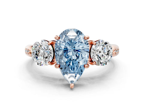 Rose gold Three-Stone Fancy Blue Pear Cut Diamond Channel Set Engagement Ring with Prong Setting