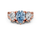 Rose gold Three-Stone Fancy Blue Pear  Cut Diamond Ring with Channel-Set Band and Four-Prong Setting_53