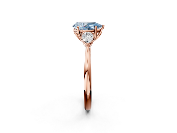 Rose gold Three-Stone Fancy Blue Pear  Cut Diamond Ring with Pear Side Stones in Four-Prong Setting