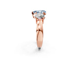 Rose gold Three-Stone Fancy Blue Pear Cut Diamond Ring with Round Side Stones, Classic Band, and Four-Prong Setting_2