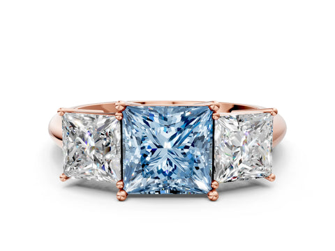 Rose gold Three-Stone Fancy Blue Princess Cut Cut Diamond Engagement Ring with Prong Setting on a White Gold Band