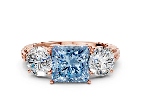 Rose gold Three-Stone Fancy Blue Princess Cut Cut Diamond Ring with Channel-Set Band and Prong Setting