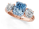 Rose gold Three-Stone Fancy Blue Radiant Cut Cut Diamond Ring with Channel-Set Band and Prong Setting_1