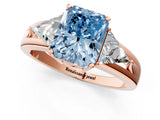 Rose gold Three-Stone Fancy Blue Radiant Cut Cut Diamond Ring with Trillion Side Stones on a Split Shank Band_1