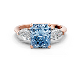 Rose gold Three-Stone Fancy Blue Radiant  Diamond Ring with Pear Side Stones in Four-Prong Setting_59