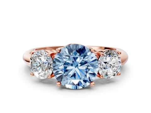Rose gold Three-Stone Fancy Blue Round Cut Cut Diamond Engagement Ring with Prong Setting on a White Gold Band