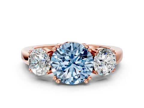 Rose gold Three-Stone Fancy Blue Round Cut Cut Diamond Ring with Channel Set Band and Four-Prong Setting