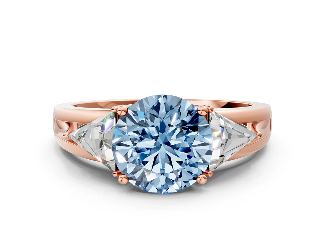 Rose gold Three-Stone Fancy Blue Round Cut Cut Diamond Ring with Trillion Side Stones on a Split Shank Band
