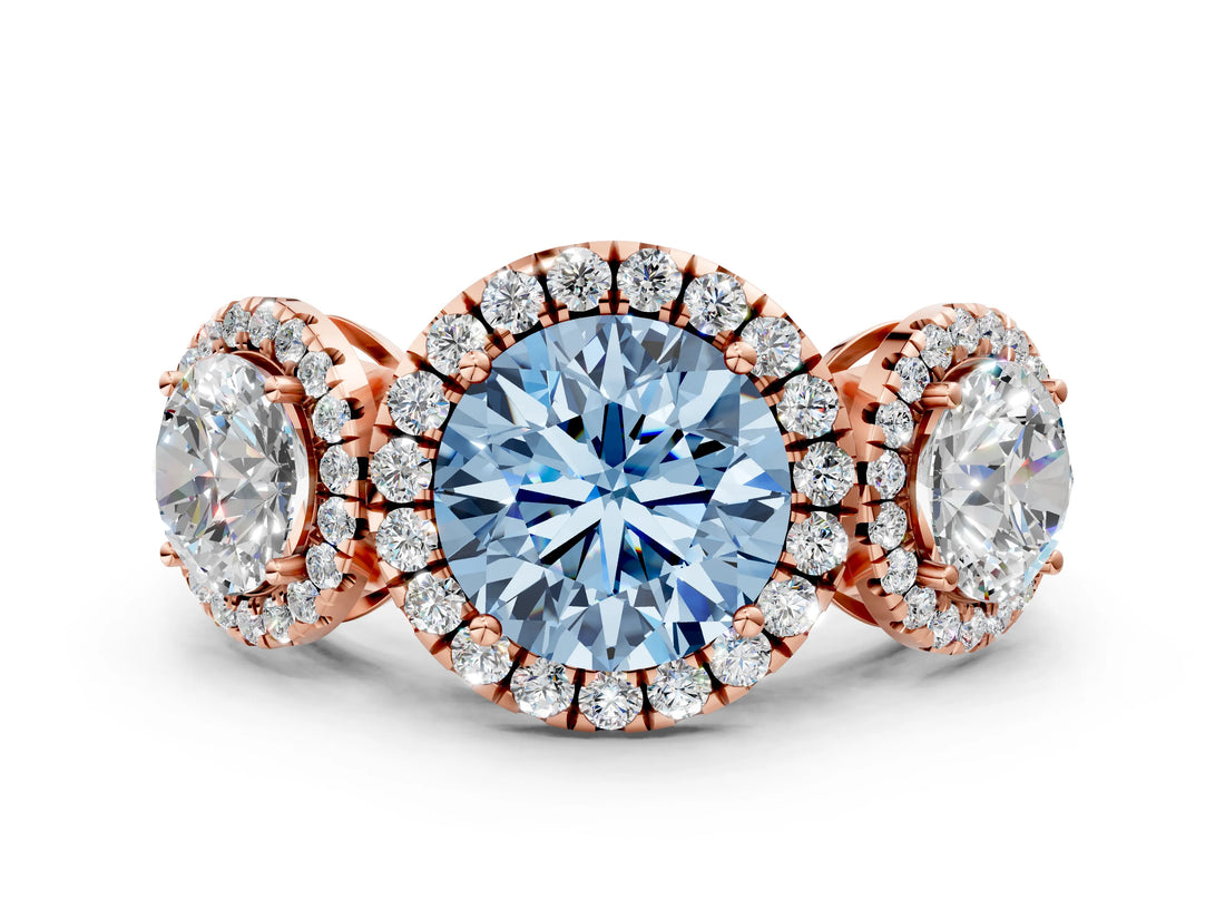 Rose gold Three-Stone Fancy Blue Round Cut Halo Diamond Ring with Pave Band and Four-Prong Setting