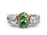 Rose gold Three-Stone Fancy Green Oval Cut Diamond Ring with Round Side Stones, Classic Band, and Four-Prong Setting