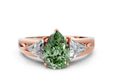 Rose gold Three-Stone Fancy Green Pear Cut Cut Diamond Ring with Trillion Side Stones on a Split Shank Band