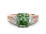 Rose gold Three-Stone Fancy Green Radiant Cut Cut Diamond Ring with Trillion Side Stones on a Split Shank Band
