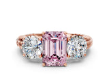Rose gold Three-Stone Fancy Pink Emerald Cut Cut Diamond Ring with Channel-Set Band and Prong Setting