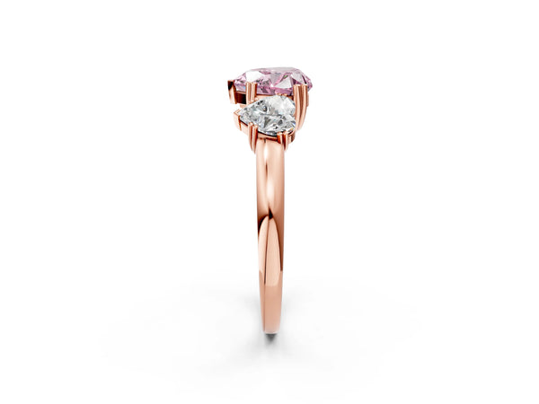 Rose gold Three-Stone Fancy Pink Heart Cut Cut Diamond Ring with Channel Set Band and Four-Prong Setting