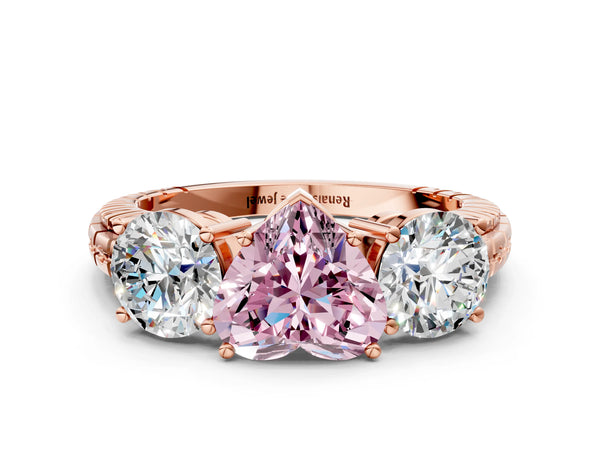 Rose gold Three-Stone Fancy Pink Heart Cut Cut Diamond Ring with Channel-Set Band and Prong Setting