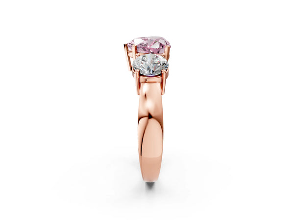 Rose gold Three-Stone Fancy Pink Heart Cut Diamond Ring with Round Side Stones, Classic Band, and Four-Prong Setting