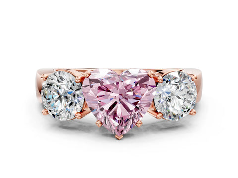 Rose gold Three-Stone Fancy Pink Heart Cut Diamond Ring with Round Side Stones, Classic Band, and Four-Prong Setting