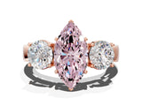 Rose gold Three-Stone Fancy Pink Marquise Cut Diamond Ring with Round Side Stones, Classic Band, and Four-Prong Setting