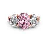 Rose gold Three-Stone Fancy Pink Oval Cut Cut Diamond Engagement Ring with Flat Band and Four-Prong Setting