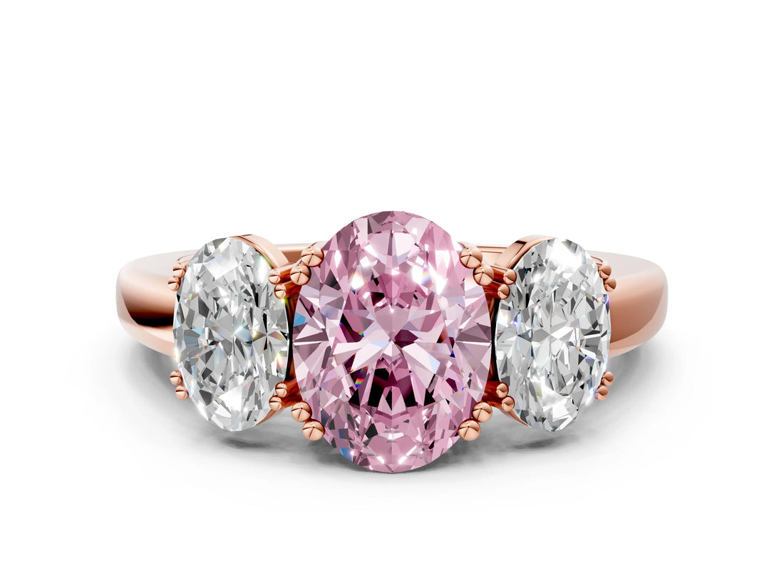 Rose gold Three-Stone Fancy Pink Oval Cut Cut Diamond Ring with Channel Set Band and Four-Prong Setting