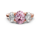 Rose gold Three-Stone Fancy Pink Oval Cut Cut Diamond Ring with Channel Set Band and Four-Prong Setting_24