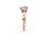 Rose gold Three-Stone Fancy Pink Oval Cut Cut Diamond Ring with Channel Set Band and Four-Prong Setting_26