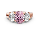 Rose gold Three-Stone Fancy Pink Oval Cut Cut Diamond Ring with Prong Setting and Classic Band