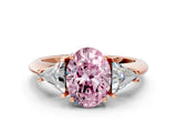 Rose gold Three-Stone Fancy Pink Oval Cut Cut Diamond Ring with Trillion Side Stones and Four-Prong Setting_3